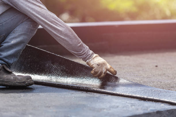 Professional Basement Waterproofing technician working in Moundville, AL